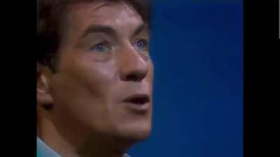 A young Sir Ian McKellen perfectly playing both Romeo and Juliet during their iconic balcony scene