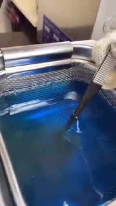 Cleansing Diamond Ring in Ultra Sonic Cleaner