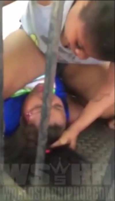 Woman gets pinned and spit her face twice for allegedly snitching 