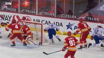 Nick Suzuki and Corey Perry each miss their hit and collide with each other