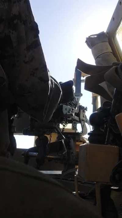 furry in the military shoots a 50. cal machine gun