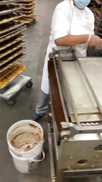 Making chocolate glazed donuts