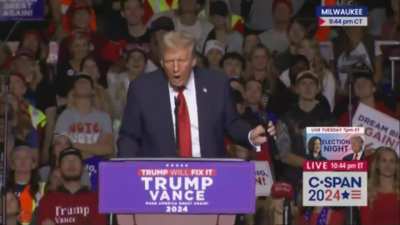 Donald Trump, GOP Presidential candidate, mimes performing oral sex on a microphone at his campaign rally