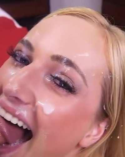 All smiles getting her beautiful face splattered with hot sticky cum