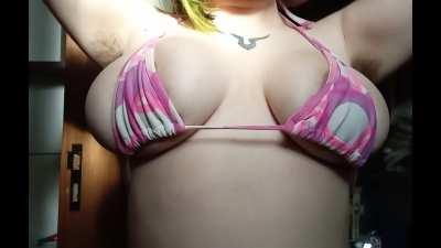 slo-mo bounce in a bikini top