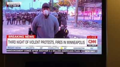 MN State Patrol arrests CNN reporter for reporting the news.