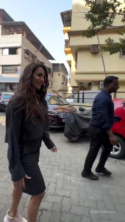 Mommy Malaika in a black outfit 