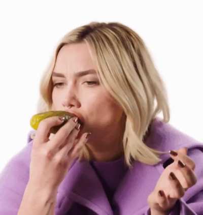 Flo showing her skills with a big pickle 