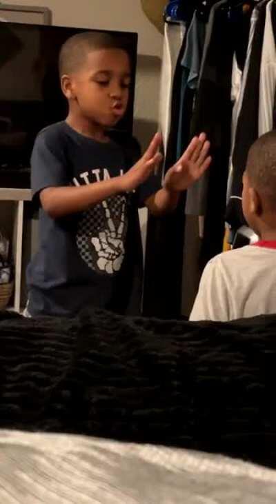 A 6-year-old teaches his upset young brother breathing techniques so he could calm down