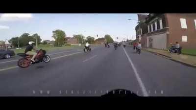 Biker riding on sidewalk 