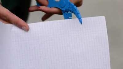 3D printed on a pair of articulated scissors