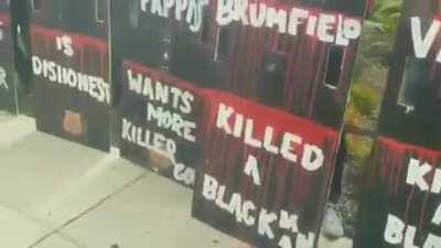 Columbus protesters create big signs lined with the names of specific Columbus Police officers & their acts of violence