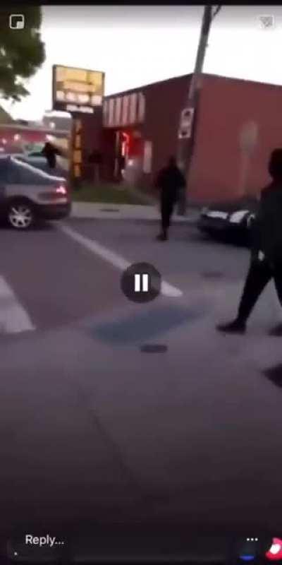 Store Owner Disperses Rioters With A Shotgun