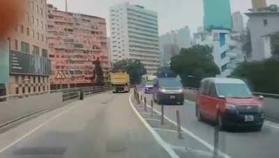 Tire fell off and bounces down an overpass.