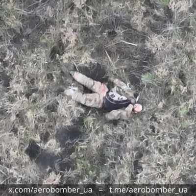 A russian invader was hit by a drone-dropped grenade and then proceeded to kill himself by stabbing a knife into his chest. Video by the Ukrainian 30th Mechanized Brigade 