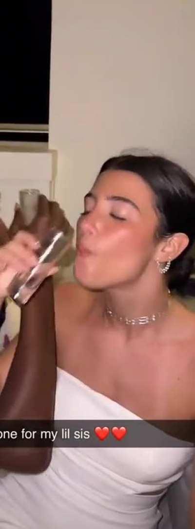 Taking a shot in bahamas with some bit of panties showing