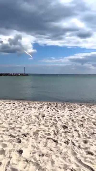 POV: You are a dinosaur chilling on the beach