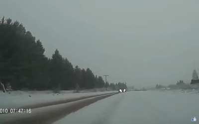 Russia: Black car hits author while skidding on ice