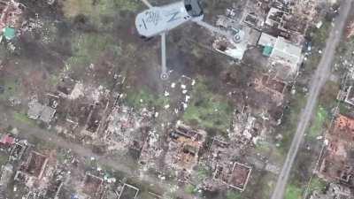 A Ukrainian drone knocking down a Russian drone coordinating artillery in the Donetsk oblast