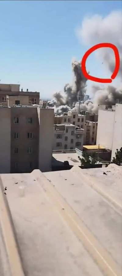 Footage of three Israeli precision-guided missiles hitting an Iranian command center in Tehran.