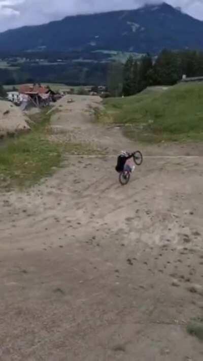 Flip and land a wheelie