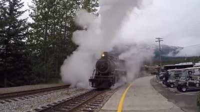 Engine 73 in Skagway AK Departing for Fraser BC. I love the way it envelops itself in Steam then appears out of the Steam. This is Engineering perfection.