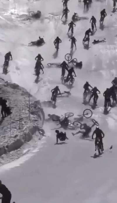 What could go wrong downhilling an icy track with 700+ mountain bikers at once?