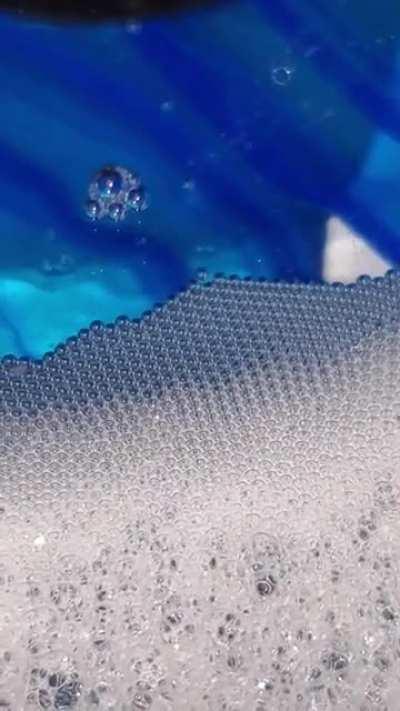 The way these bubbles flow out from this pot lid.