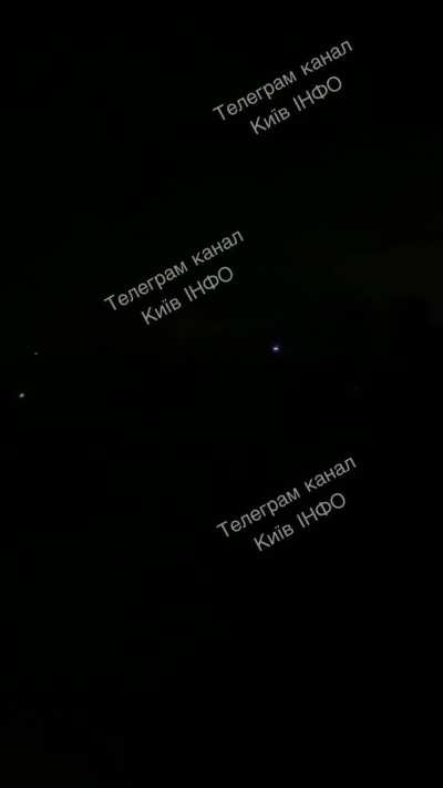 UA POV: Ukrainian civillian records the center of Kiev. A total blackout is happening. The Silhouette of buildings can be seen