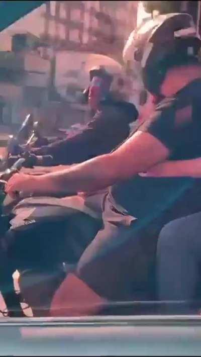 The second biker held his laugh well