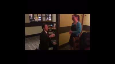 Olive Garden Wedding Proposal complete with a costume, fedora, and “I guess it’s a yes?”