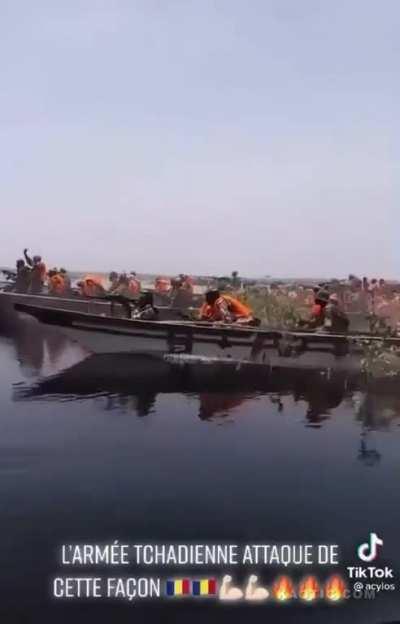 Chadian army doing a chaotic amphibious attack on boko haram positions 