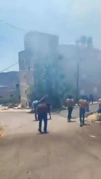 Umm Safa, Ramallah - Israeli settlers burn several Palestinian houses and other properties in the town. 
