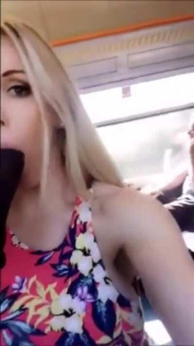 Rebecca Moore slagging it up on a train