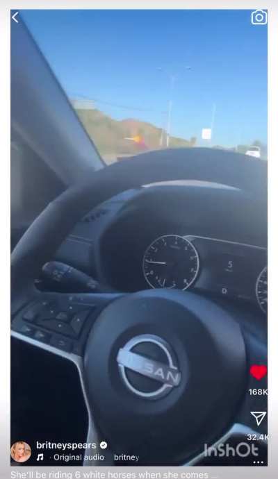 Britney Spears drives a Nissan sedan