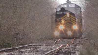 Train going over tracks that haven't been maintained for over 50 years