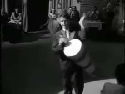 Actor Desi Arnaz performing Babalu on the hugely successful 1950s American sitcom 'I Love Lucy'. Most Americans would not have realized this is a praise song in honor of the powerful deity Babalú-Ayé. The ancient West African Orisha faith was preserved by