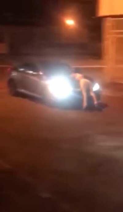 You probably shouldn't lay on top of cars like this.