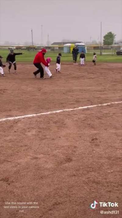 Little kid gets some help making it to first base