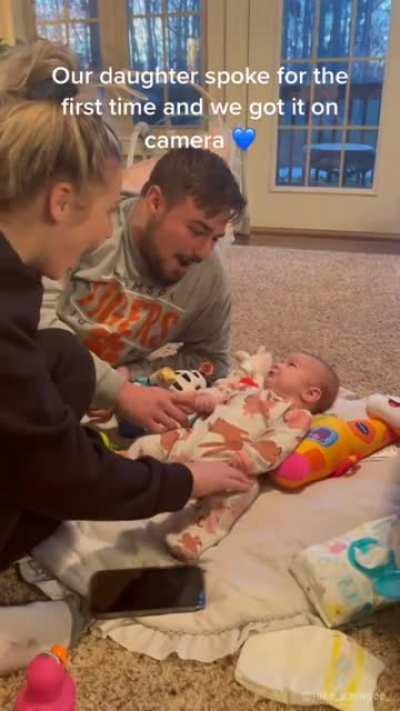 2 months old baby's first words caught on camera. she said 