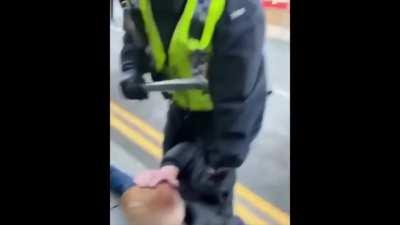 Cop gives it the beans and nearly brains a 15 year old kid.