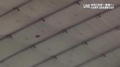 Japanese baseball star Shohei Otani hits a ball through a 2-foot gap in the roof.