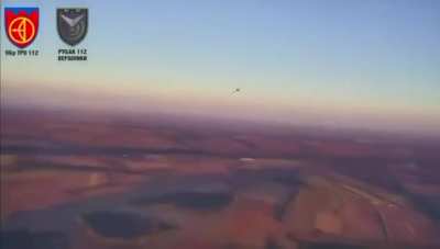 FPV footage of two Ukrainian interceptor drone pilots racing each other to shoot down a Russian Lancet UAV in the skies over Ukraine.