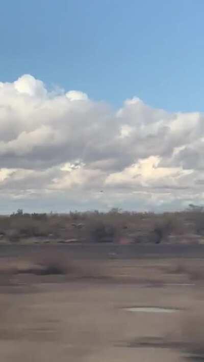 1/24/21 Quartzite, AZ. I caught this today driving on the freeway. At first, I thought it was a drone, however it was actually further out therefore too large to be a drone. Towards the end it starts to fade out. What do you all think?