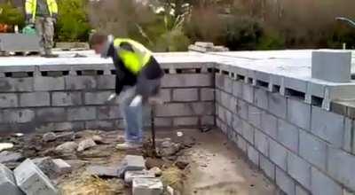 Construction worker tries to use shovel as a pogo stick