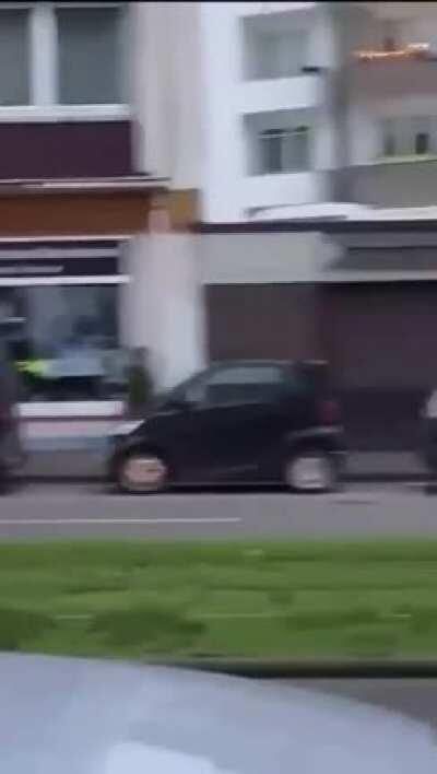 Anti-Covid measures protesters drive car around Wuppertal, Germany chanting over loudspeaker 