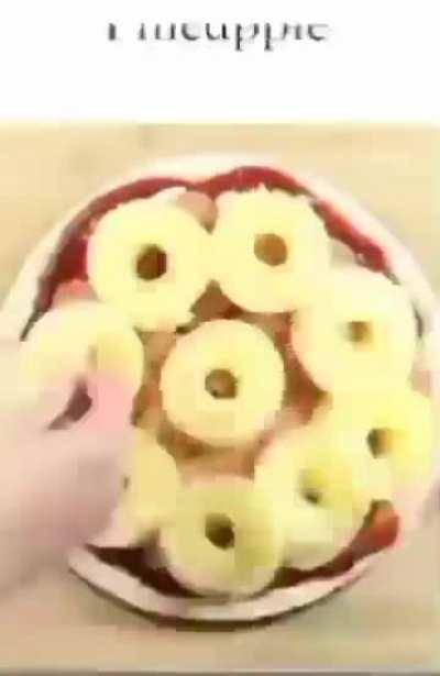 Pineapple pizza is not a crime, but i think whoever made this pizza Exaggerated