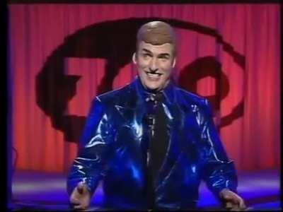 Standup Comedian performs as a robot, his movements are uncanny