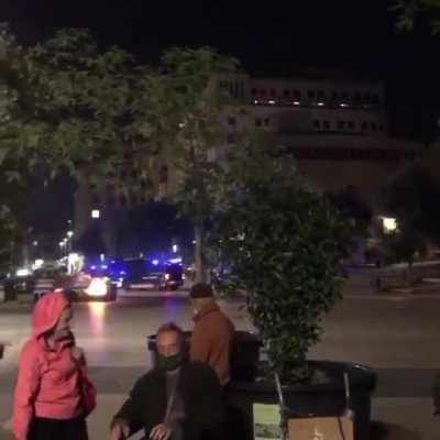 Piano man calmly keeps playing during riot in Barcelona