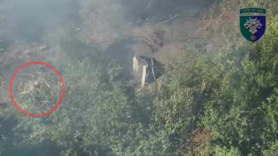 An Ukrainian soldier from the 38th Separate Marine Brigade fires a rpg at close range at a dugout with Russian personnel in the Pokrovsk direction, Donetsk region.